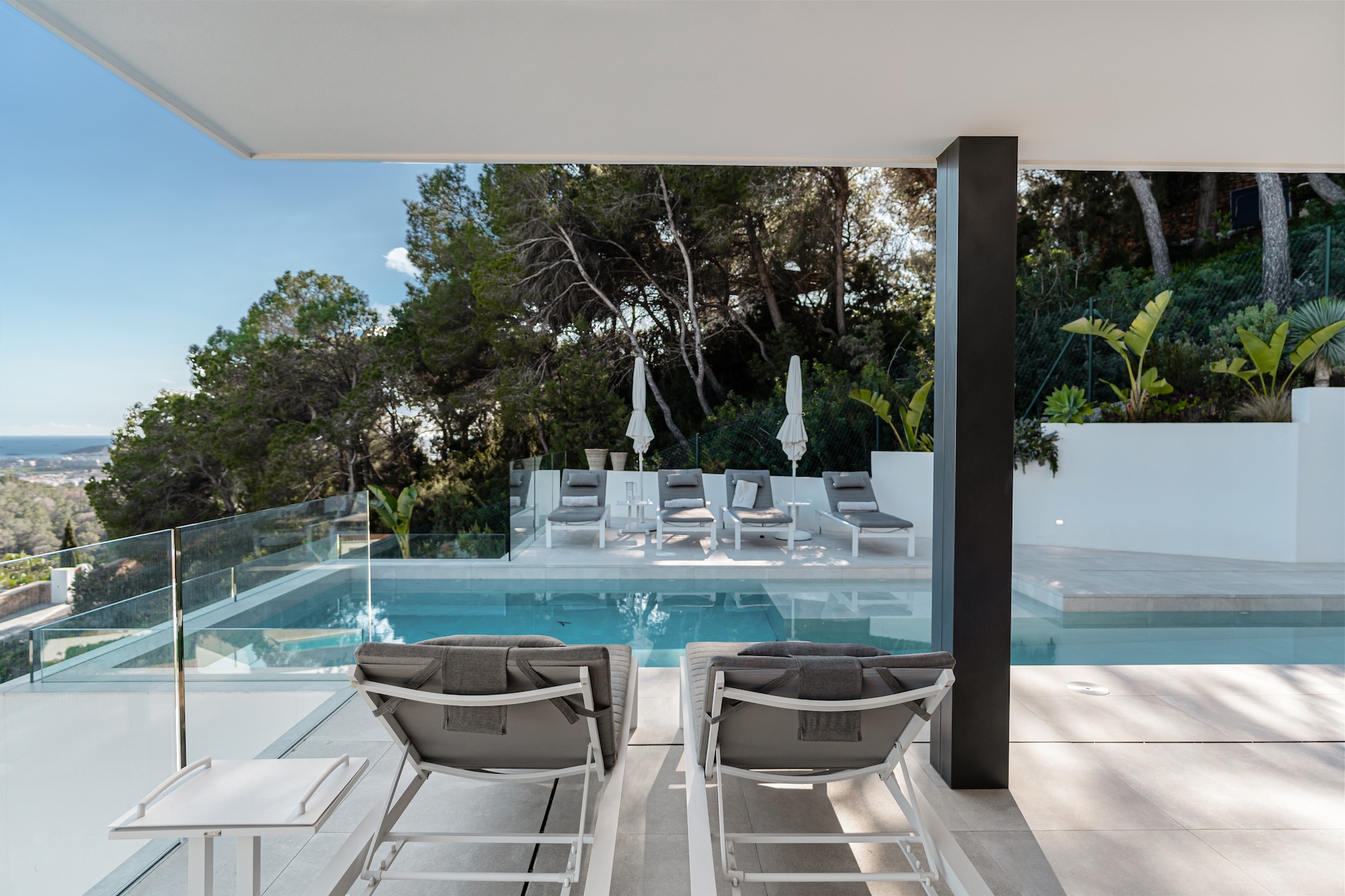 Resa Estates luxury vila Can Furnet modern Villa moderna terrace and day beds.jpg